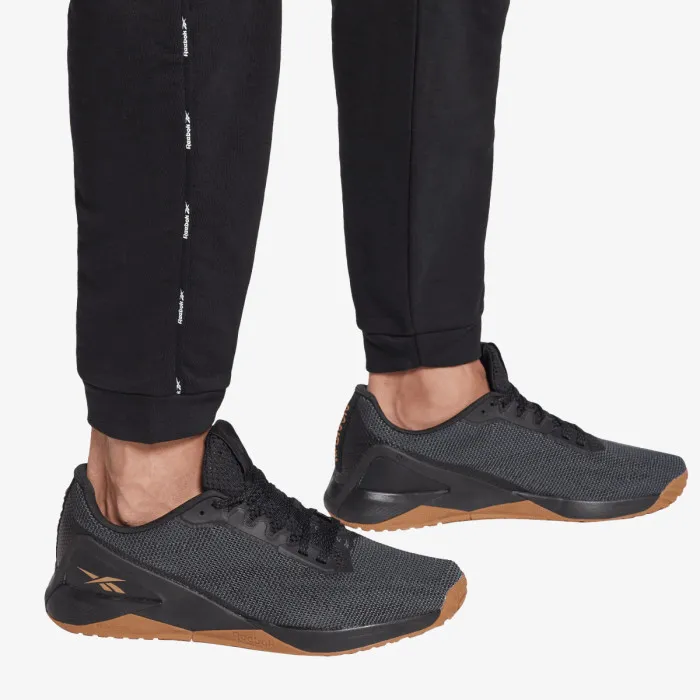 REEBOK WOR PIPING JOGGER 